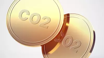 duas moedas de ouro dizendo CO² no meio